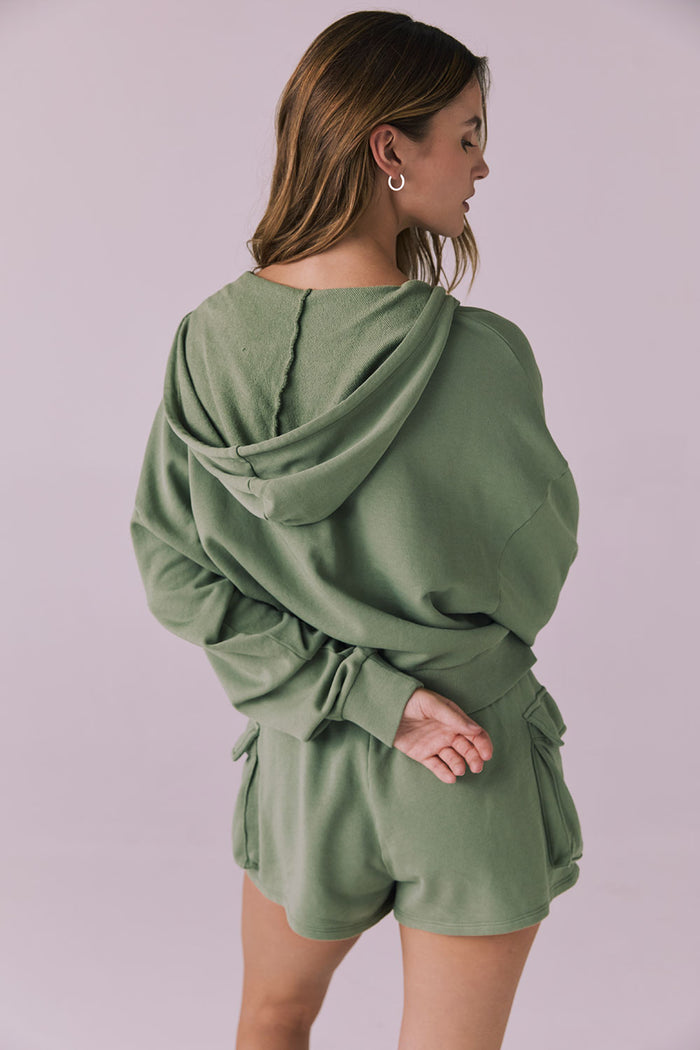 Back view of the Chaser Abilene Meadow Green Zip Up Hoodie showcasing the hood and smooth fleece texture