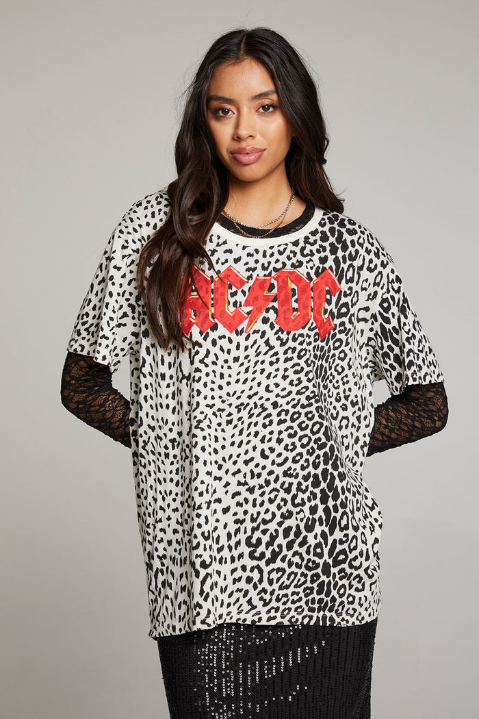 Front view of model wearing AC/DC Animal Print Logo Tee with red band logo and leopard print design against a plain background
