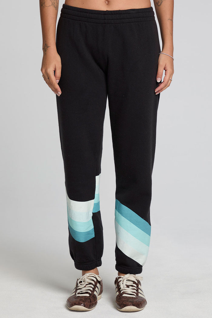Front view of a woman wearing the Chaser Ada Black Jogger on a neutral background with arms at sides