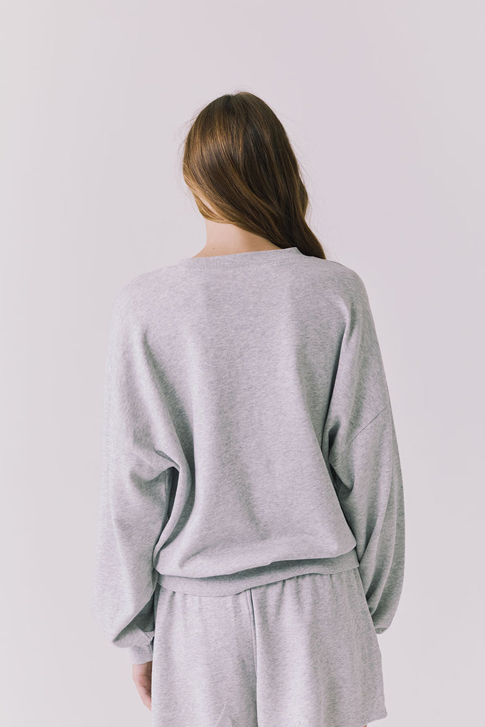 Back view of the Chaser Ain’t My First Rodeo Long Sleeve in Heather Grey