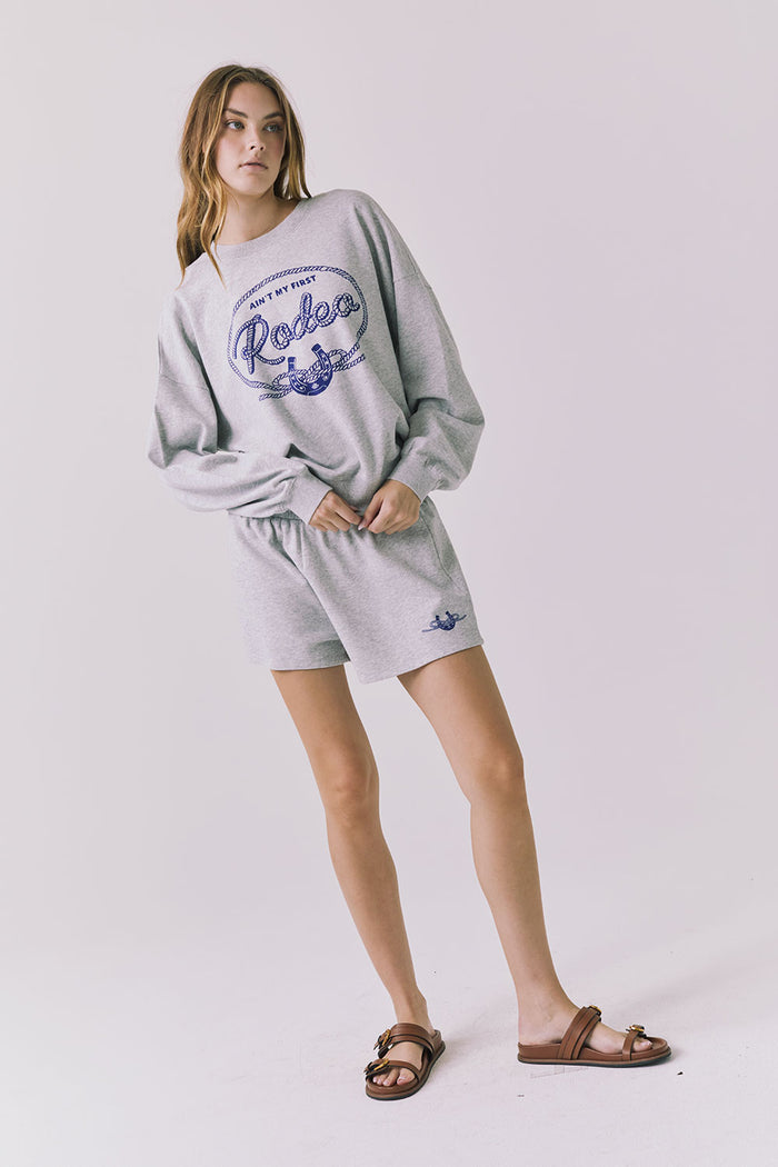 Full body view of the Chaser Ain’t My First Rodeo Long Sleeve paired with matching Ain’t My First heather grey shorts
