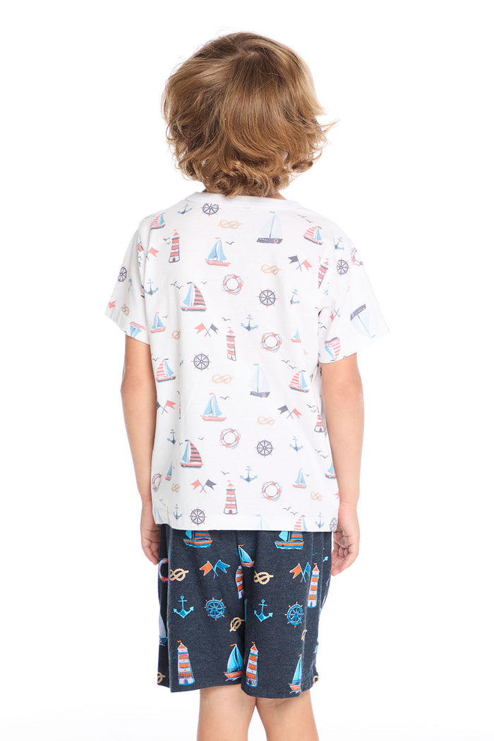 Back view of the Chaser Kids Allover Sailboats Tee in white with allover sailboat print on a white background