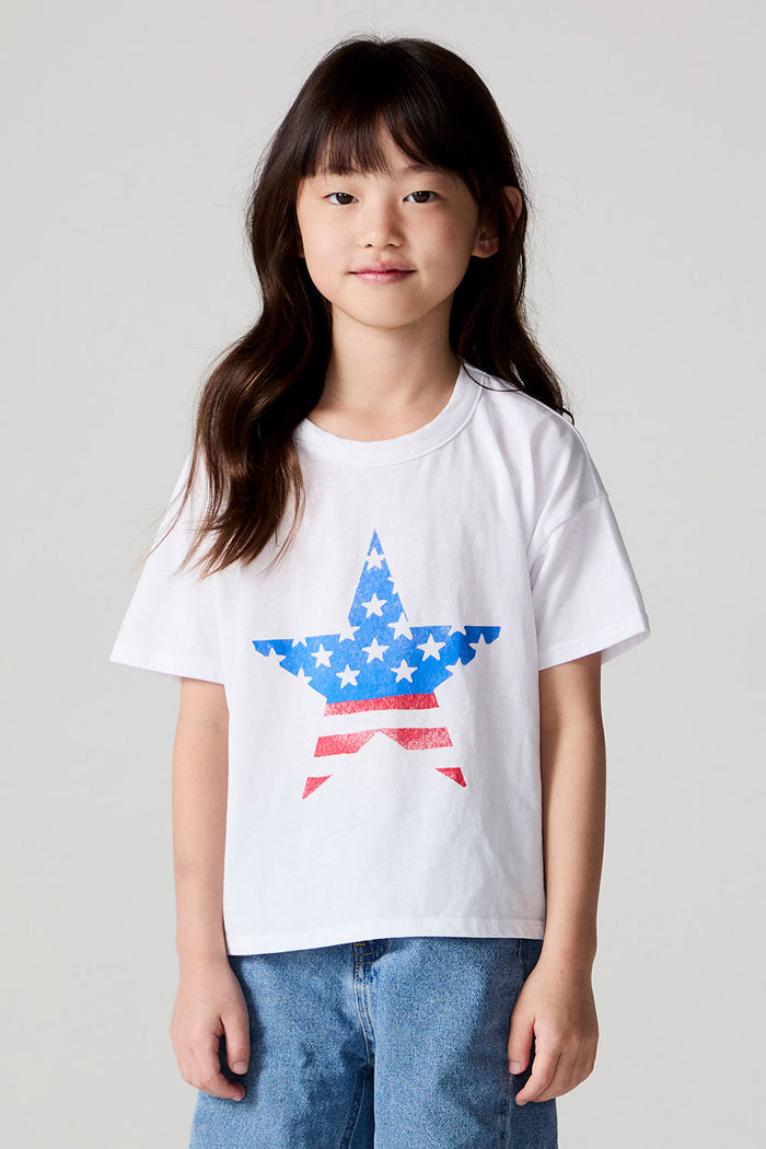 Front view of a girl wearing the Chaser  Americana Star Tee on a neutral background