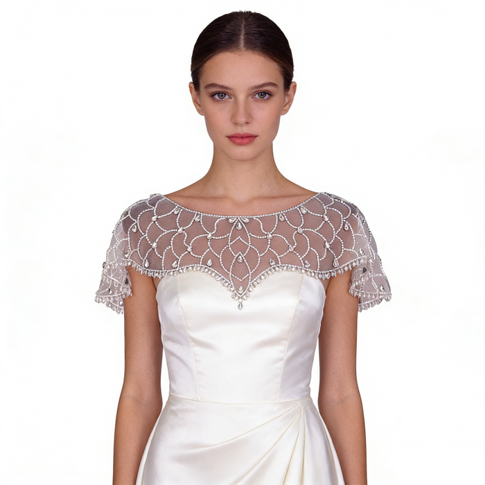 Luxury handmade bridal capelet featuring crystal bead embroidery and sheer tulle.