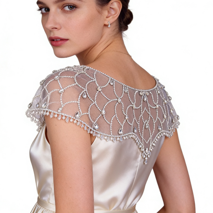Luxury handmade bridal capelet featuring crystal bead embroidery and sheer tulle.