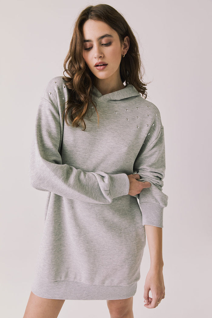 Woman wearing Chaser's Aster Heather Grey Hoodie Dress on a plain background