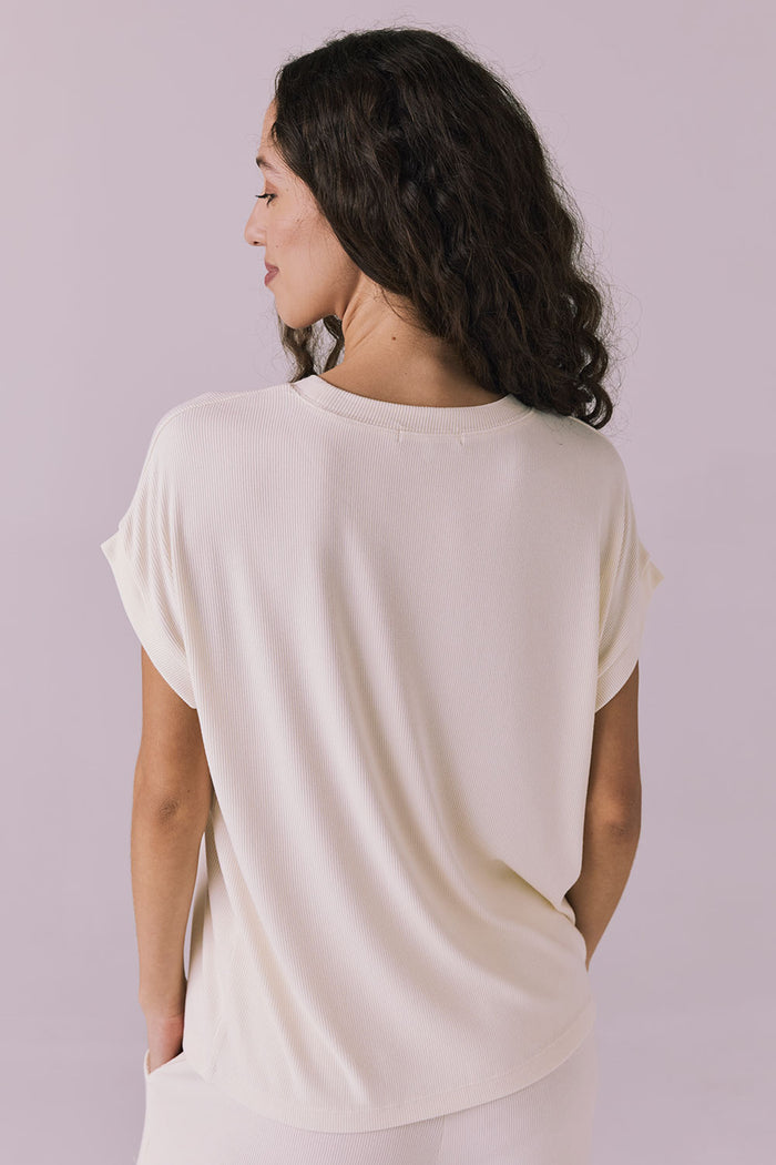 Back view of the Chaser Audrey Starry White Tee showing the straight hem and smooth finish