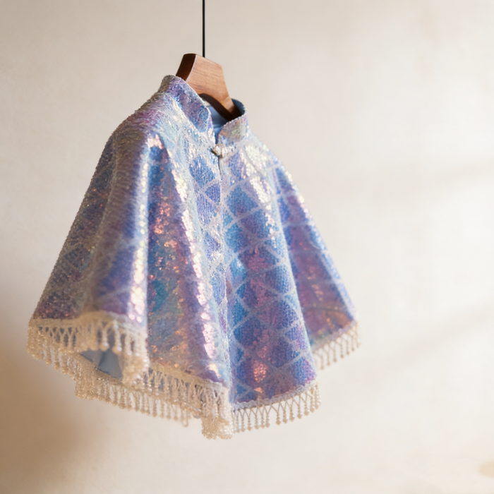 Iridescent aurora sequin bridal capelet with pearl fringe, colorful mermaid shimmer wedding dress shoulder cover.