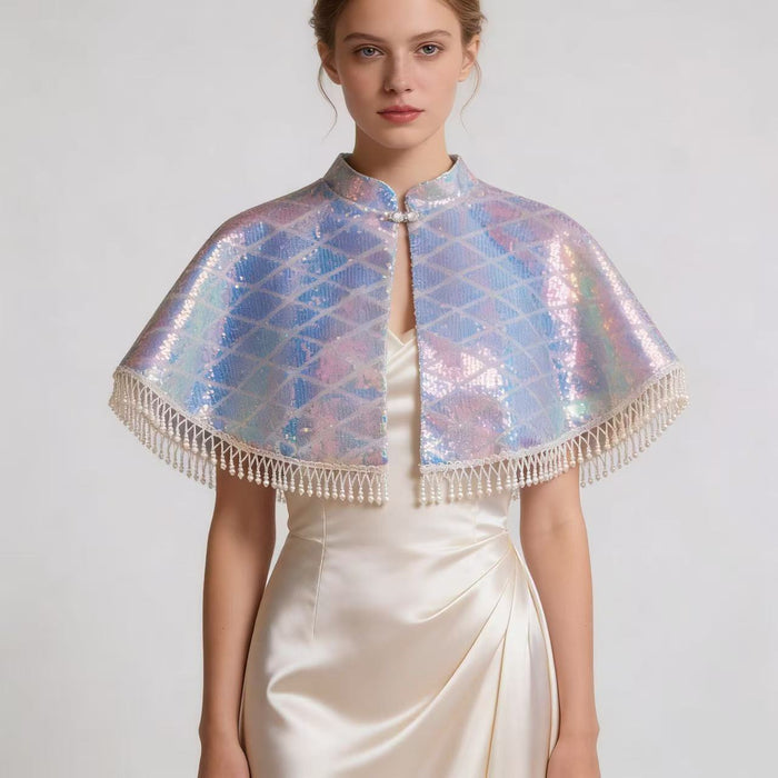 Handmade short wedding cape with pearl tassel trim and holographic sequin fabric for bridal gowns and formal occasions.