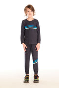 Full body view of boy wearing Chaser’s Avalon Lounge Pant with blue stripe strappings and matching top against a white background