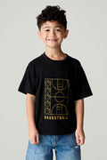 Front view of a boy wearing the Chaser  Basketball Boys Tee on a neutral background and jeans with arms lowered