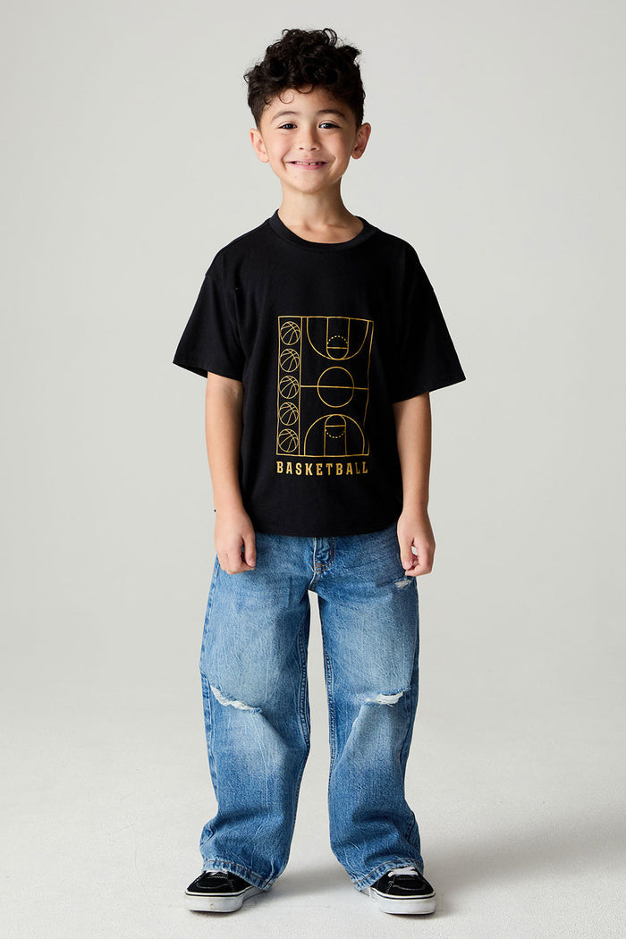 A full body front view of a boy wearing the Chaser  Basketball Boys Tee on a neutral background