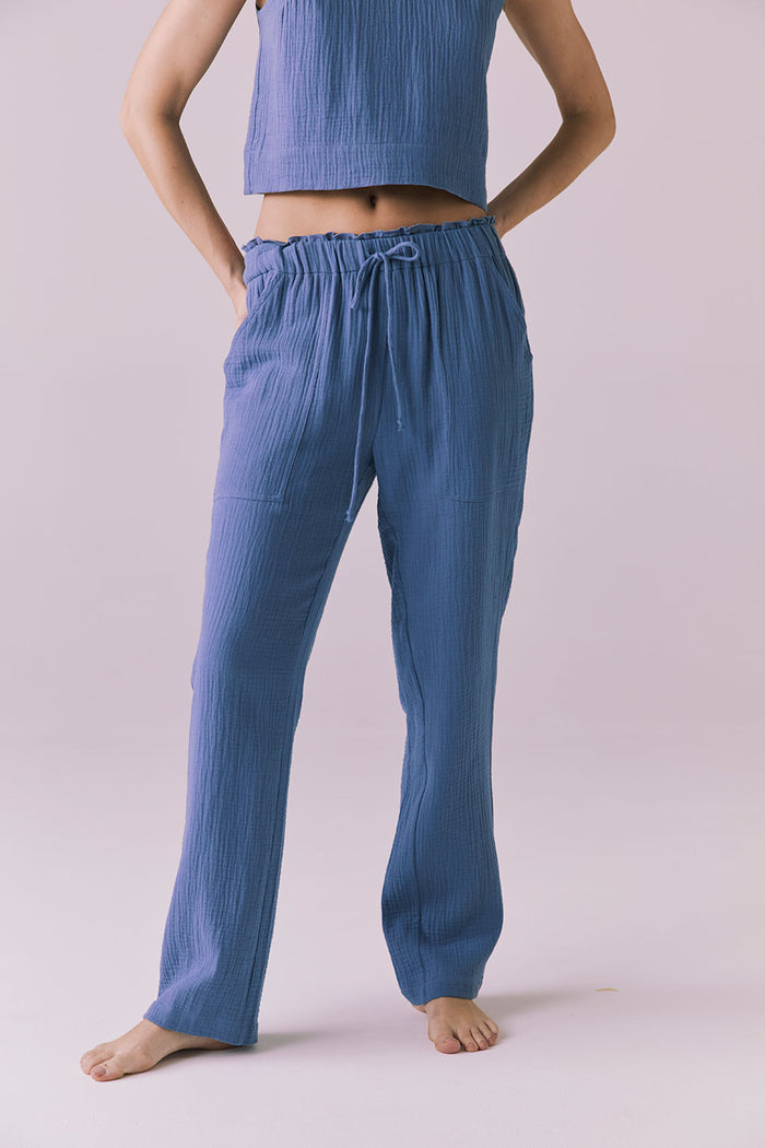 Model wearing the Chaser Bellow Future Grey Joggers featuring a relaxed fit and soft crinkle cotton texture