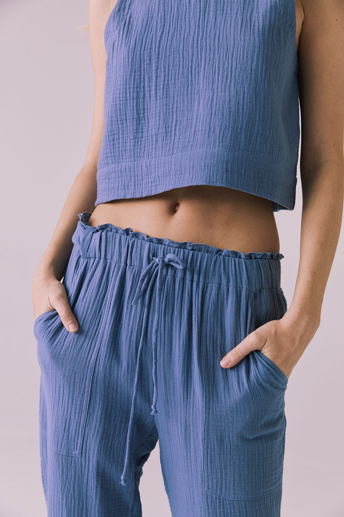 Model wearing the Chaser Bellow Future Grey Joggers highlighting the drawstring waist and pockets