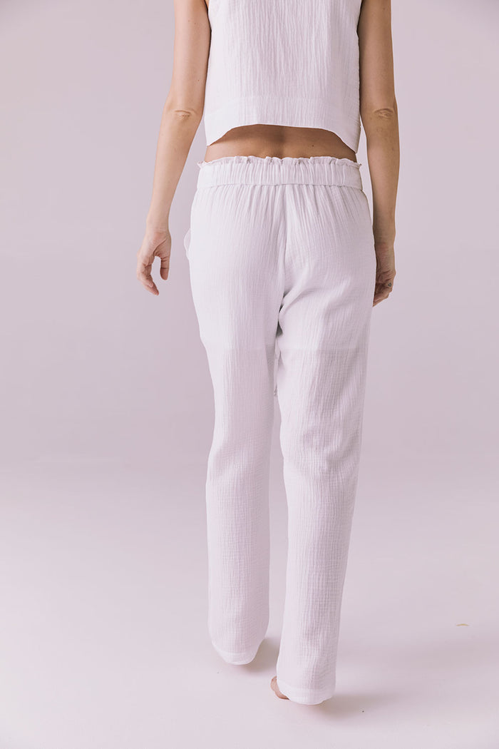Back view of the Chaser Bellow White Joggers showing the elastic waistband and easy straight leg design