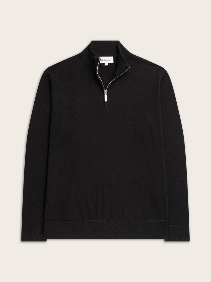 Black quarter-zip sweater laid flat, front view with ribbed hem and collar.