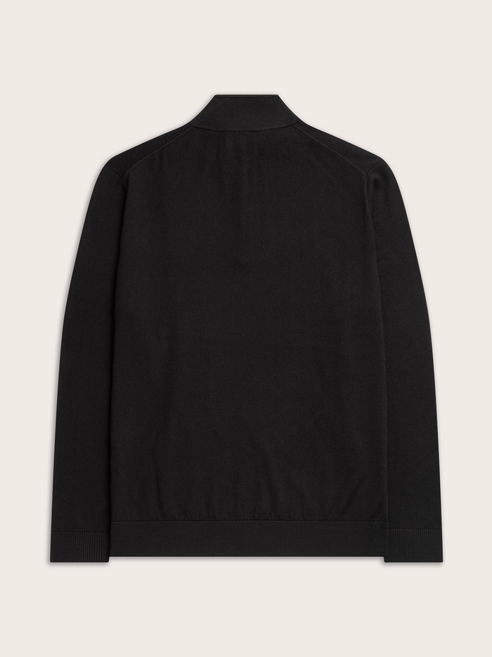 Black quarter-zip sweater laid flat, back view showing ribbed cuffs and hem.