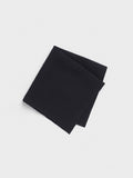 Folded black linen pocket square on a light grey background.