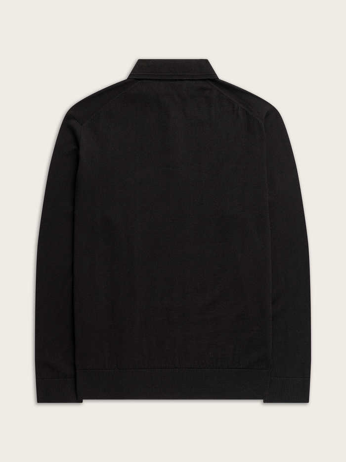 Black long-sleeve polo sweater, flat lay, back view, cream background.