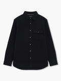 A man wearing a black regular fit shirt with long sleeves, a pointed collar and button down fastening.