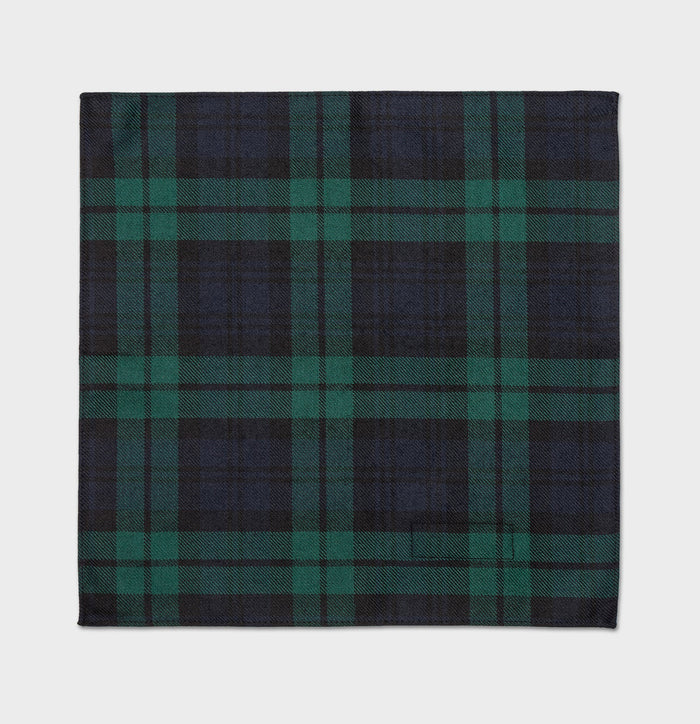 Black watch tartan pocket square laid flat, showing plaid pattern.
