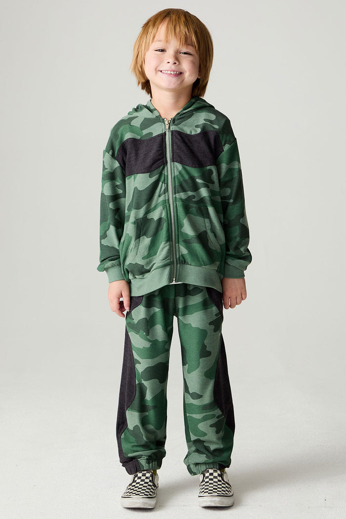 A full body front view of a boy wearing the Chaser Blocked Camo Boys Hoodie on a neutral background