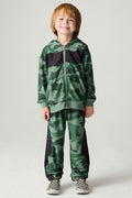 Full body front view of a boy wearing the Chaser Blocked Camo Pants Boys Jogger on a neutral background with matching top