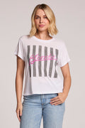 Front view of a woman wearing the Chaser  Blondie Parallel Lines Tee and jeans on a neutral background