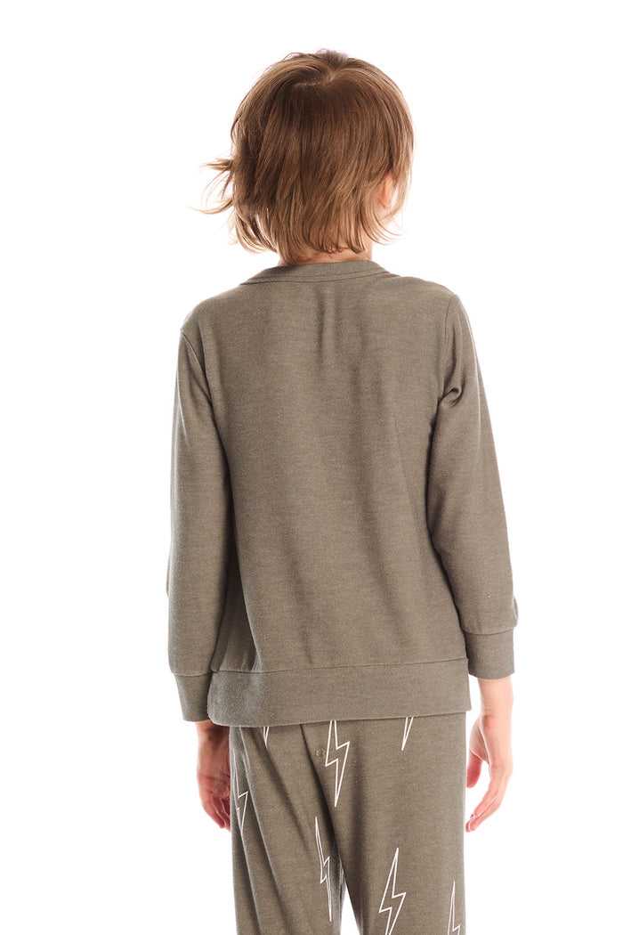 Back view of boy wearing Chaser’s Bolt safari green long sleeve top with lightning bolt design and matching pants on a white background.