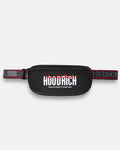A black cross body bag with a wide, patterned black and red strap. The front features a bold white 'HOODRICH' logo with red graffiti-style lettering above it and smaller white text below reading 'FROM NOTHING TO SOMETHING'.
