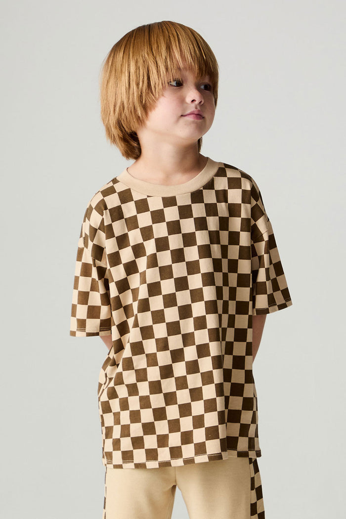 Front view of a boy wearing the Chaser Boys Solara Check Tee on a neutral background with matching lounge pants