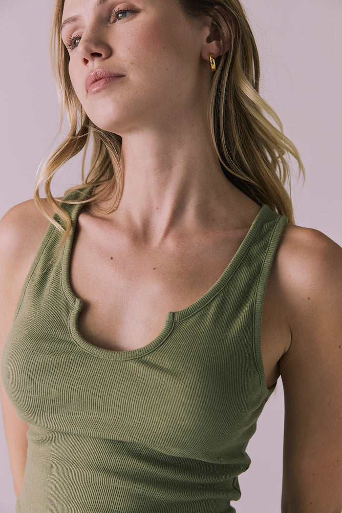 Close-up of the Chaser Brandi Meadow Green Tank focusing on the neckline and fine rib knit fabric