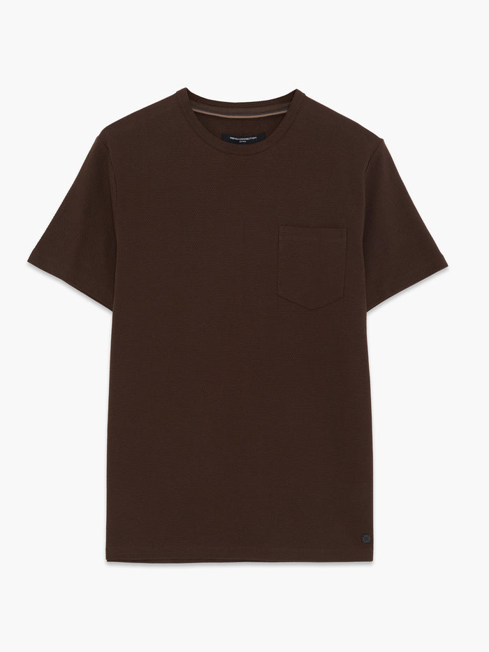 A man wearing a brown cotton textured T-Shirt with short sleeves, a crew neckline, 1 patch chest pocket and a regular fit.