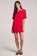 Front view of a woman wearing the Chaser Cardinal Red Carlo Mini Dress on a neutral background, standing at a slight angle