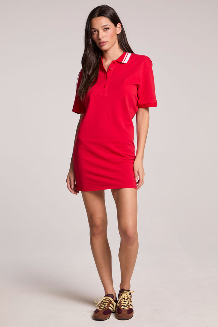 Front view of a woman wearing the Chaser Cardinal Red Carlo Mini Dress on a neutral background, standing at a slight angle