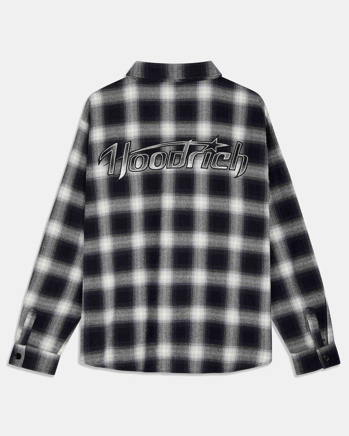 A long-sleeve plaid flannel shirt in black and white, featuring a large 'Hoodrich' logo printed across the chest, shown against a light gray background.