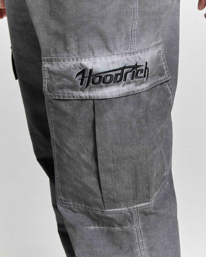 Gray pants with 'Hoodrich' logo on a white background