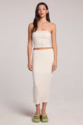 A full body front view of a woman wearing the Chaser Coconut Milk Catch Midi Skirt on a neutral background