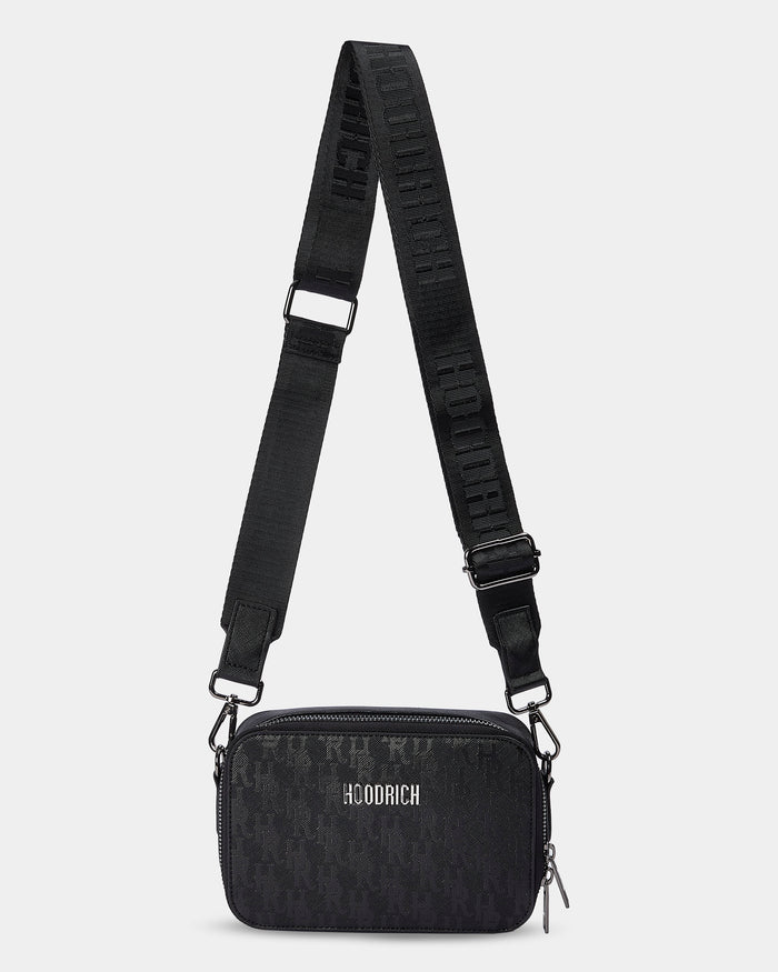 Black crossbody bag with a visible brand logo on a white background