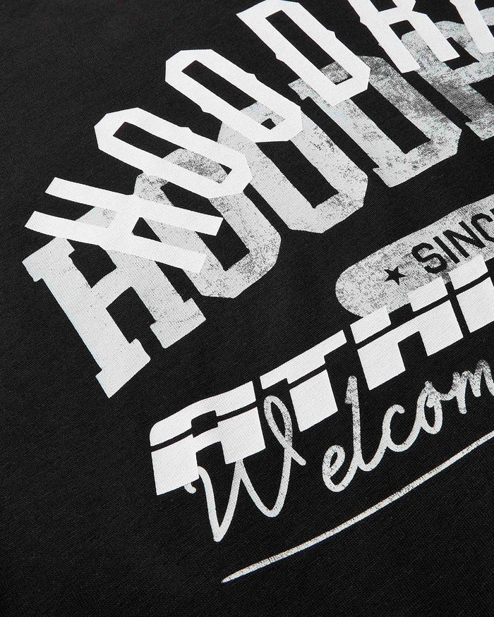 Black t-shirt with white and gray text design on a black background