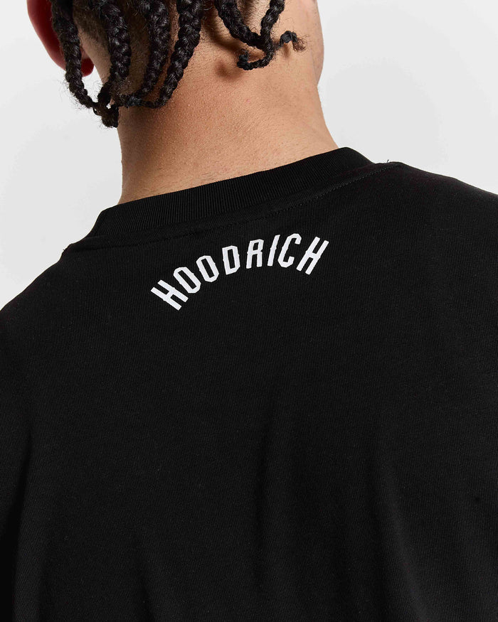 Black t-shirt with 'HOODRICH' branding on a plain background