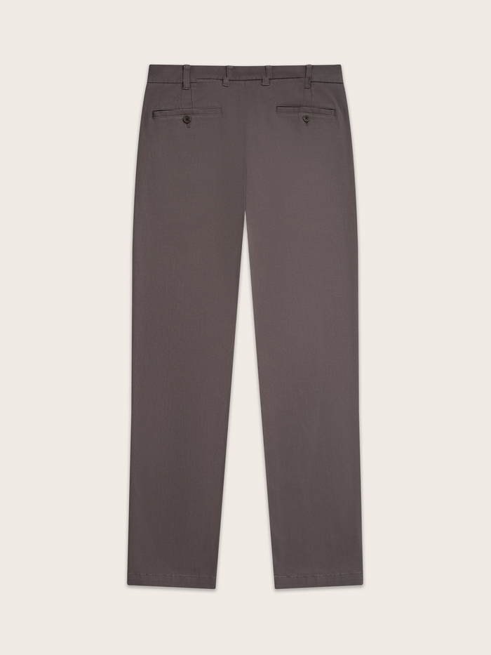 Grey chino pants laid flat, back view, showing welt back pockets.