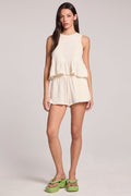 Front view of a woman wearing the Chaser Coconut Milk Atlantis Shorts set on a neutral background