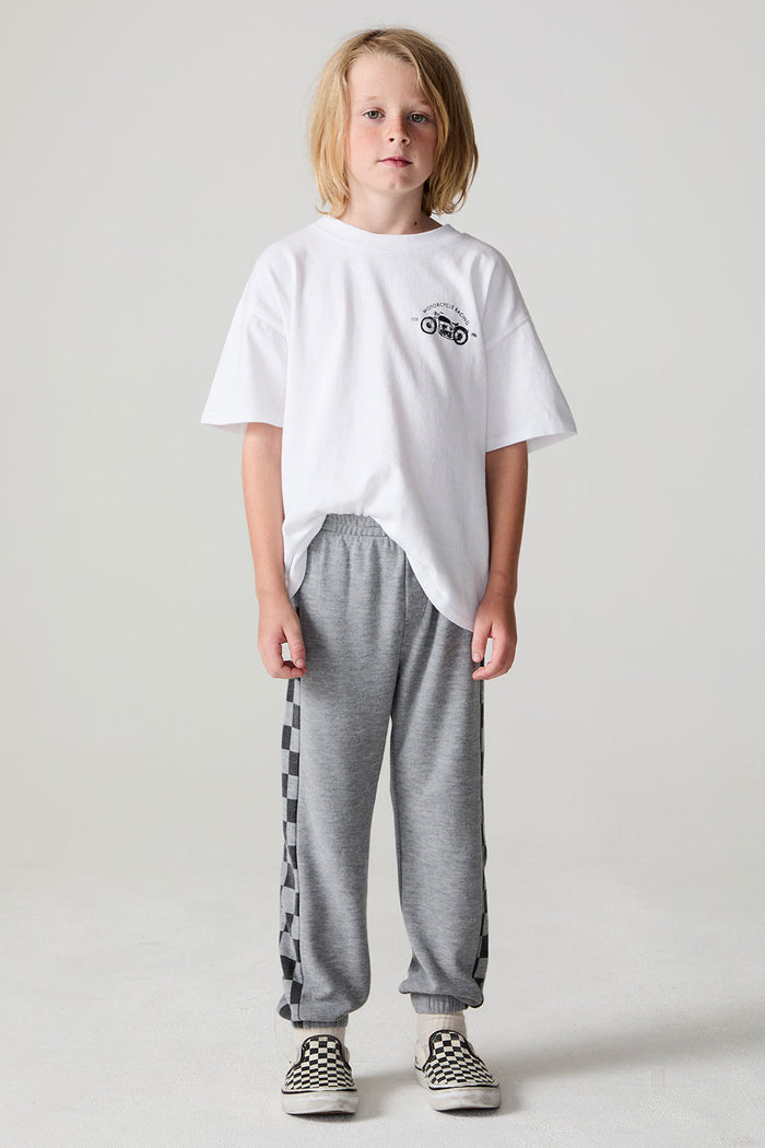 Full body front view of a boy wearing the Chaser Color Block Heather Grey Barrel Leg Pants on a neutral background