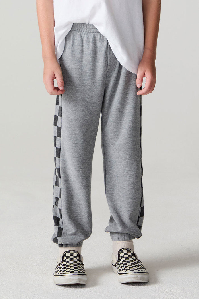 Front view of a boy wearing the Chaser Color Block Heather Grey Barrel Leg Pants on a neutral background