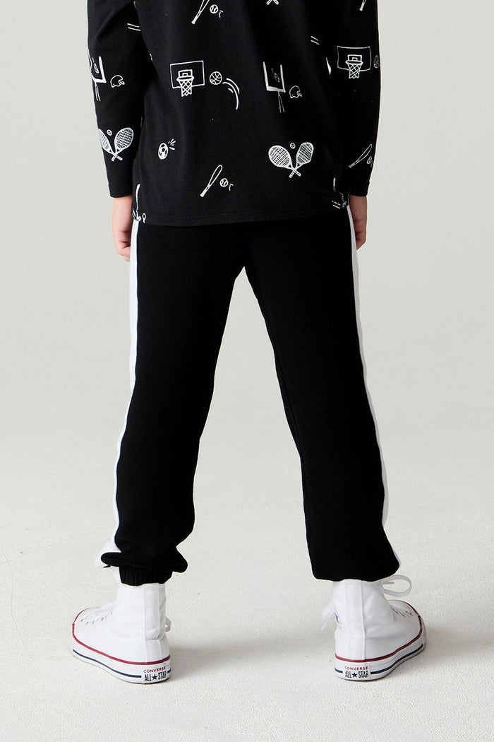Back view of a boy wearing the Chaser Blocked Lounge Pants Boys Black Jogger on a neutral background