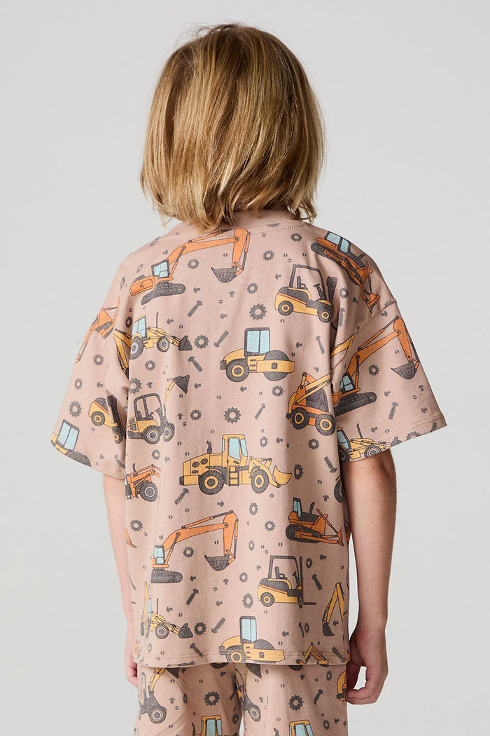 Back view of a boy wearing the Chaser Construction Days Tee on a neutral background