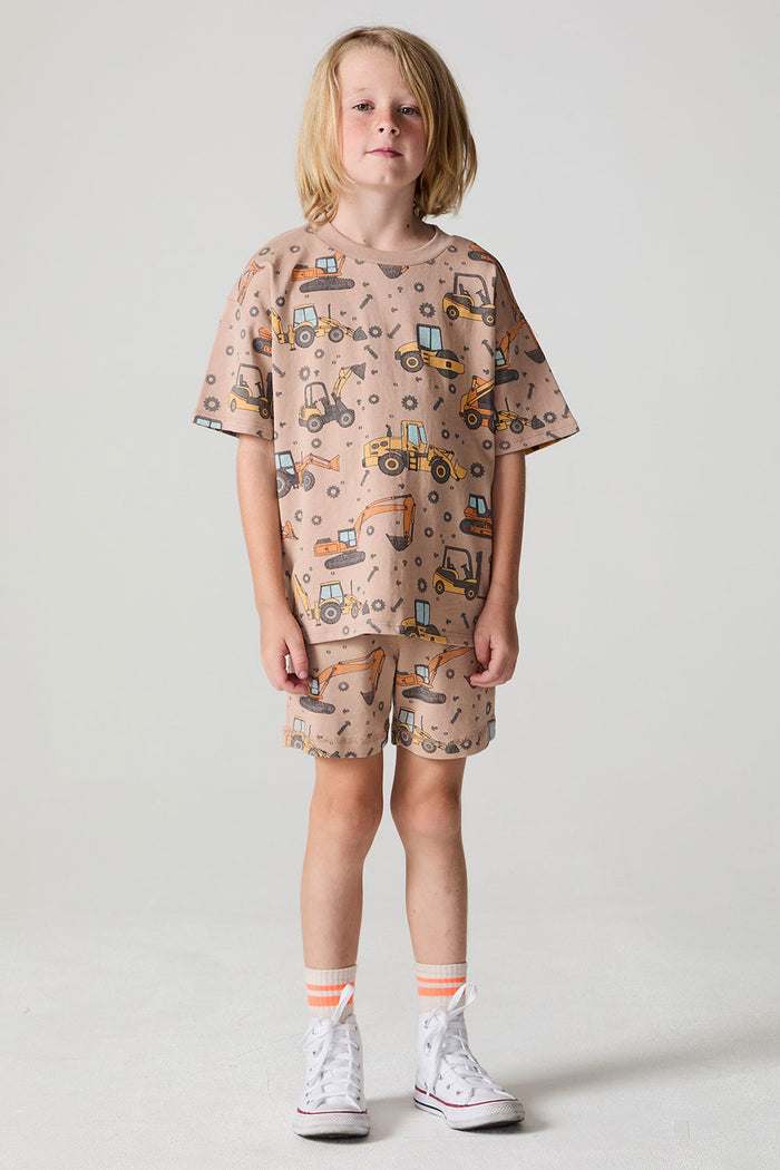 Full body front view of a boy wearing the Chaser Construction Days Tee on a neutral background