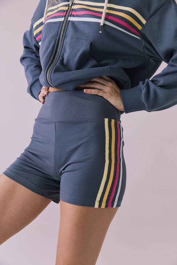 Side view of the Chaser Contrast Strappings Shorts showing the multi-stripe detail and smooth, body-hugging fit