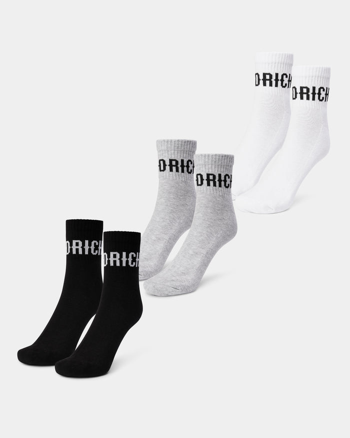 Three pairs of OG Core branded quarter socks in black, white, and grey, displayed against a white background.